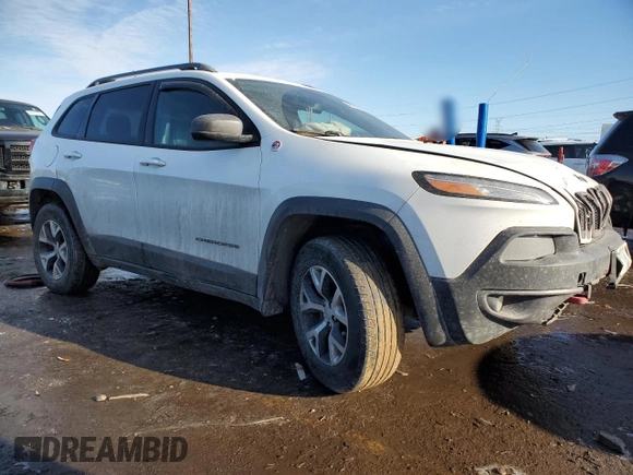 2015 Jeep Cherokee Trailhawk with VIN 1C4PJMBB5FW778883, listed as a Copart auction lot 44444555 with 113,194 mi miles and Salvage title. Bid and sale history available at DreamBid. Image 4.