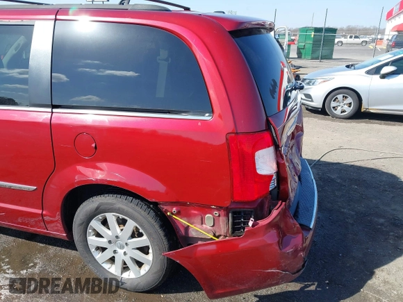 2013 Chrysler Town & Country Touring z VIN 2C4RC1BG7DR777172, wystawiony jako IAAI lot #41780881 z przebiegiem 196 768 mil mil oraz . Historia ofert i sprzedaży dostępna na DreamBid. Obrazek 21.