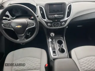 2020 Chevrolet Equinox LS z VIN 2GNAX5EV7L6256494, wystawiony jako IAAI lot #42575792 z przebiegiem 23 809 mil mil oraz . Historia ofert i sprzedaży dostępna na DreamBid. Obrazek 2.