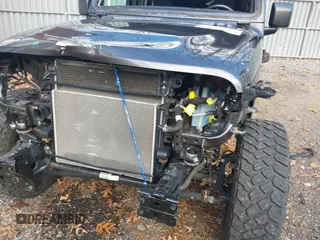 2021 Jeep Wrangler Unlimited Sport S with VIN 1C4HJXDN4MW518307, listed as a IAAI auction lot 41222996 with 39,499 mi miles and . Bid and sale history available at DreamBid. Image 6.
