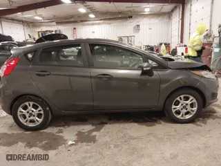 2015 Ford Fiesta SE with VIN 3FADP4EJ8FM138306, listed as a IAAI auction lot 41227124 with 106,741 mi miles. Bid and sale history available at carsss.com. Image 13.