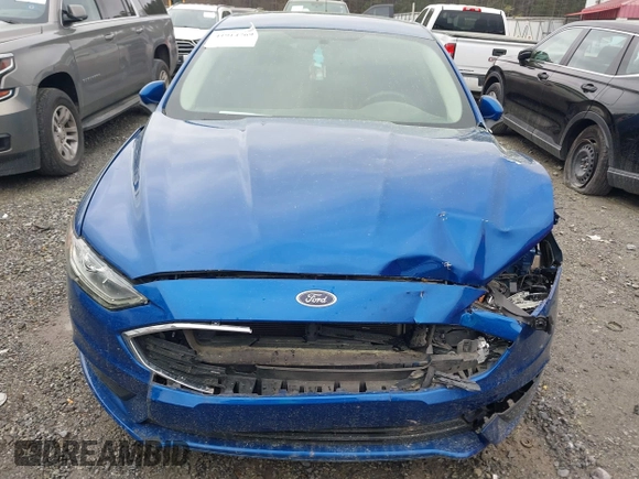 2017 Ford Fusion SE z VIN 3FA6P0H77HR309263, wystawiony jako IAAI lot #41914769 z przebiegiem 136 833 mil mil oraz . Historia ofert i sprzedaży dostępna na DreamBid. Obrazek 6.