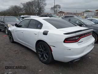 2019 Dodge Charger SXT with VIN 2C3CDXBG9KH598841, listed as a IAAI auction lot 41093938 with 112,359 mi miles. Bid and sale history available at carsss.com. Image 3.