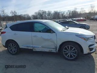2020 Acura RDX Technology with VIN 5J8TC2H52LL033263, listed as a IAAI auction lot 41293471 with 62,393 mi miles and . Bid and sale history available at DreamBid. Image 13.