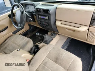 2001 Jeep Wrangler SE with VIN 1J4FA29P51P323174, listed as a Copart auction lot 82175184 with 262,098 mi miles and Clean Title. Bid and sale history available at carsss.com. Image 8.