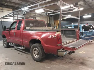 2002 Ford Super Duty F-250 XL with VIN 1FTNX21L82EA87027, listed as a IAAI auction lot 41893004 with 214,580 mi miles. Bid and sale history available at carsss.com. Image 3.