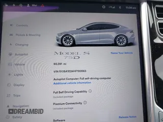 2017 Tesla Model S 100D with VIN 5YJSA1E24HF193563, listed as a IAAI auction lot 42120120 with 60,391 mi miles and . Bid and sale history available at DreamBid. Image 7.