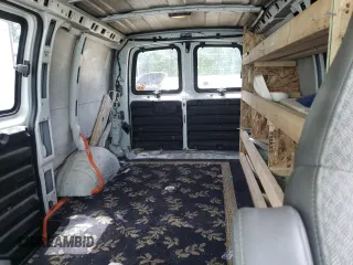 2005 Chevrolet Express Cargo with VIN 1GCFG15T051142218, listed as a Copart auction lot 57409005 with 185,725 mi miles and Salvage title. Bid and sale history available at DreamBid. Image 10.