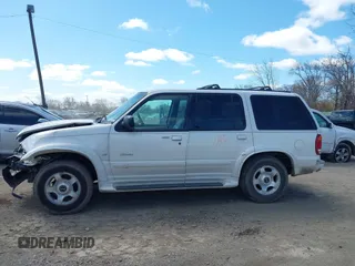 2000 Ford Explorer z VIN 1FMZU85P3YZA94717, wystawiony jako IAAI lot #42029041 z przebiegiem 218 304 mil mil oraz . Historia ofert i sprzedaży dostępna na DreamBid. Obrazek 13.