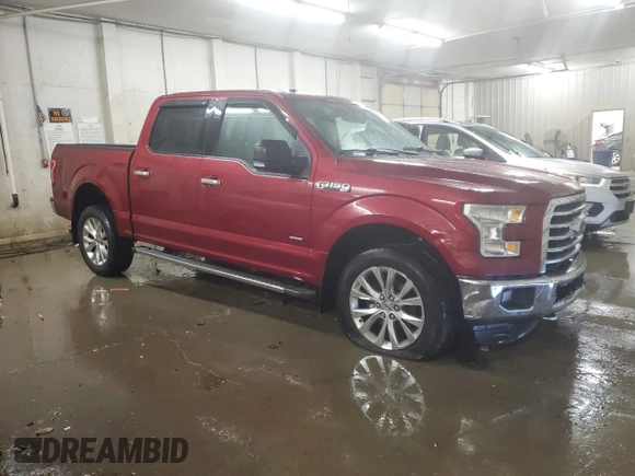 2015 Ford F-150 XLT with VIN 1FTEW1EP7FFC49319, listed as a Copart auction lot 56142895 with 125,052 mi miles and Salvage title. Bid and sale history available at DreamBid. Image 4.