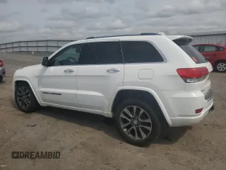2018 Jeep Grand Cherokee Overland with VIN 1C4RJFCG5JC437508, listed as a Copart auction lot 51814795 with 104,598 mi miles and Salvage title. Bid and sale history available at DreamBid. Image 2.