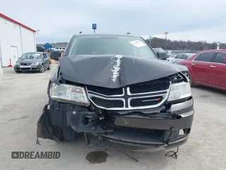 2017 Dodge Journey SE with VIN 3C4PDCABXHT694909, listed as a IAAI auction lot 41640828 with 188,657 mi miles and . Bid and sale history available at DreamBid. Image 6.