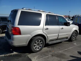 2003 Lincoln Navigator Ultimate with VIN 5LMFU27R93LJ10247, listed as a Copart auction lot 77715274 with 194,422 mi miles and Salvage Title. Bid and sale history available at carsss.com. Image 3.