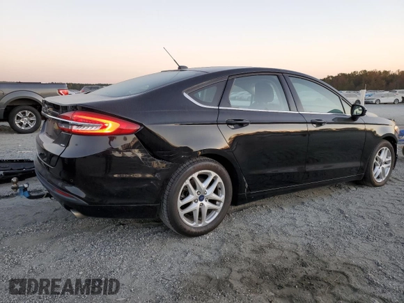 2018 Ford Fusion SE z VIN 3FA6P0H72JR132966, wystawiony jako Copart lot #76664004 z przebiegiem 145 653 mil mil oraz Szkoda całkowita • Salvage title. Historia ofert i sprzedaży dostępna na DreamBid. Obrazek 3.
