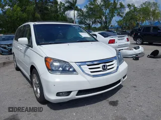 2008 Honda Odyssey Touring with VIN 5FNRL38858B006304, listed as a IAAI auction lot 41814309 with 208,778 mi miles. Bid and sale history available at carsss.com. Image 12.