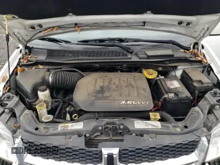 2018 Dodge Grand Caravan SXT z VIN 2C4RDGCG9JR133702, wystawiony jako Copart lot #85824554 z przebiegiem 140 881 mil mil oraz Szkoda całkowita • Salvage title. Historia ofert i sprzedaży dostępna na DreamBid. Obrazek 14.