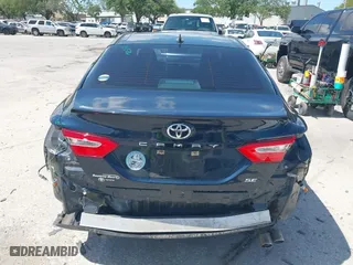 2020 Toyota Camry SE with VIN 4T1G11AK5LU500066, listed as a IAAI auction lot 42000886 with 99,153 mi miles. Bid and sale history available at carsss.com. Image 16.