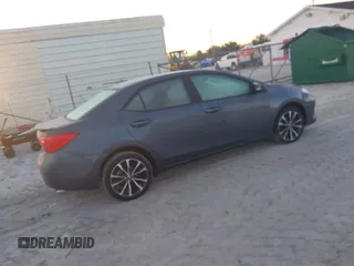 2017 Toyota Corolla L with VIN 2T1BURHE7HC775527, listed as a IAAI auction lot 42030932 with Not provided miles and . Bid and sale history available at DreamBid. Image 4.
