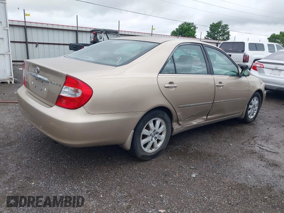 2002 Toyota Camry LE z VIN 4T1BE32K52U086150, wystawiony jako IAAI lot #42126685 z przebiegiem 175 212 mil mil oraz . Historia ofert i sprzedaży dostępna na DreamBid. Obrazek 4.