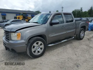 2013 GMC Sierra 1500 SLT with VIN 3GTP2WE25DG134770, listed as a Copart auction lot 59616535 with 212,304 mi miles and Salvage title. Bid and sale history available at DreamBid. Image 1.