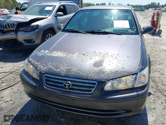 2000 Toyota Camry CE z VIN 4T1BG22K5YU989265, wystawiony jako IAAI lot #41800338 z przebiegiem 381 964 mil mil oraz . Historia ofert i sprzedaży dostępna na DreamBid. Obrazek 6.