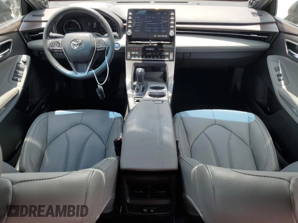 2021 Toyota Avalon Hybrid XLE z VIN 4T1AA1AB8MU007487, wystawiony jako Copart lot #57241445 z przebiegiem 63 154 mil mil oraz Nie do naprawy • Non repairable. Historia ofert i sprzedaży dostępna na DreamBid. Obrazek 8.