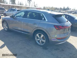 2019 Audi e-tron Premium Plus with VIN WA1LAAGE4KB012574, listed as a IAAI auction lot 41916641 with 104,911 mi miles. Bid and sale history available at carsss.com. Image 3.