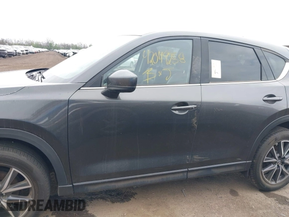 2017 Mazda CX-5 Grand Touring with VIN JM3KFBDL3H0143194, listed as a IAAI auction lot 42049258 with 74,159 mi miles. Bid and sale history available at carsss.com. Image 14.