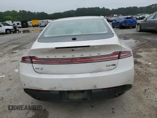2013 Lincoln MKZ z VIN 3LN6L2J91DR823693, wystawiony jako Copart lot #55827045 z przebiegiem 173 978 mil mil oraz Szkoda całkowita • Salvage title. Historia ofert i sprzedaży dostępna na DreamBid. Obrazek 6.