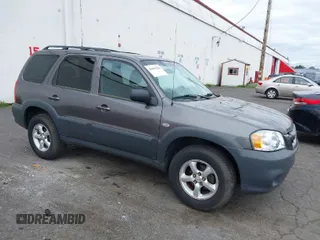 2005 Mazda Tribute i with VIN 4F2YZ02Z25KM56663, listed as a IAAI auction lot 42004224 with 108,804 mi miles and . Bid and sale history available at carsss.com. Image 1.