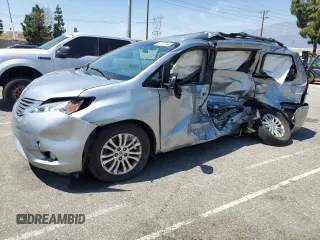 2014 Toyota Sienna XLE with VIN 5TDYK3DC7ES523796, listed as a Copart auction lot 52195795 with 0 mi miles and Salvage Title. Bid and sale history available at carsss.com. Image 1.