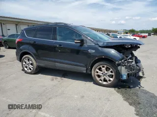 2013 Ford Escape SEL z VIN 1FMCU9HX1DUC17266, wystawiony jako Copart lot #63678025 z przebiegiem 196 206 mil mil oraz Szkoda całkowita • Salvage title. Historia ofert i sprzedaży dostępna na DreamBid. Obrazek 4.