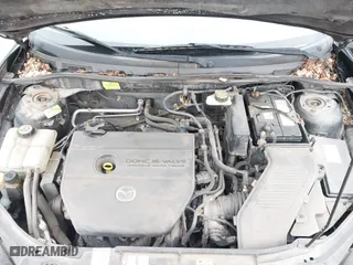 2007 Mazda Mazda3 s Touring with VIN JM1BK323571640804, listed as a IAAI auction lot 41913603 with 134,147 mi miles. Bid and sale history available at carsss.com. Image 10.