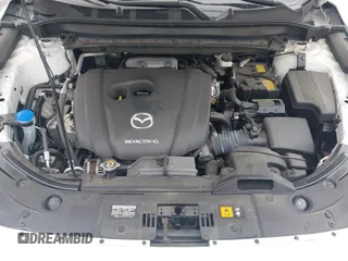 2020 Mazda CX-5 Grand Touring with VIN JM3KFBDM5L0731373, listed as a IAAI auction lot 41900567 with 31,268 mi miles and . Bid and sale history available at DreamBid. Image 10.
