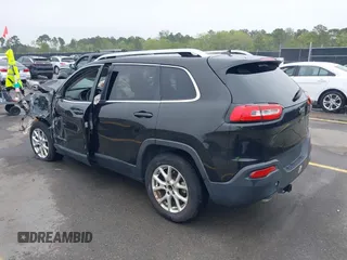 2015 Jeep Cherokee Latitude with VIN 1C4PJLCB9FW737360, listed as a IAAI auction lot 41939681 with 226,603 mi miles and . Bid and sale history available at carsss.com. Image 3.