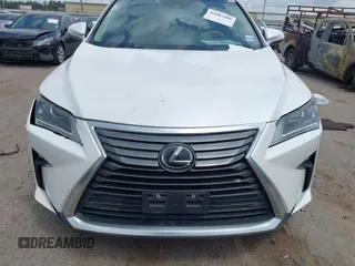 2016 Lexus RX 350 z VIN 2T2ZZMCAXGC001550, wystawiony jako IAAI lot #42083488 z przebiegiem 93 377 mil mil oraz . Historia ofert i sprzedaży dostępna na DreamBid. Obrazek 12.