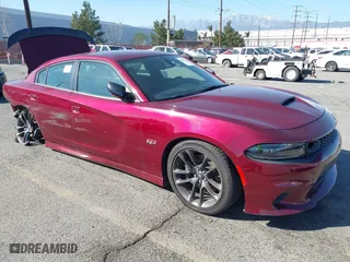 2023 Dodge Charger Scat Pack Widebody with VIN 2C3CDXGJ2PH583643, listed as a IAAI auction lot 41627260 with 21,497 mi miles. Bid and sale history available at carsss.com. Image 1.