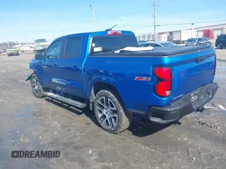 2023 Chevrolet Colorado 4WD Z71 with VIN 1GCPTDEKXP1247067, listed as a IAAI auction lot 41760802 with 21,259 mi miles. Bid and sale history available at carsss.com. Image 3.
