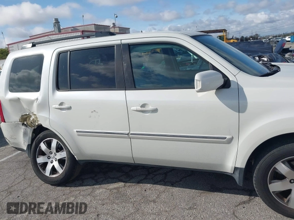 2015 Honda Pilot Touring with VIN 5FNYF3H93FB007766, listed as a IAAI auction lot 41932052 with 131,036 mi miles. Bid and sale history available at carsss.com. Image 13.