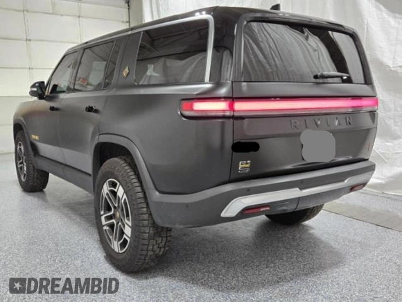 2023 Rivian R1S Launch Edition with VIN 7PDSGABL2PN020404, listed as a Copart auction lot 81428984 with 128 mi miles and Clean Title. Bid and sale history available at carsss.com. Image 3.