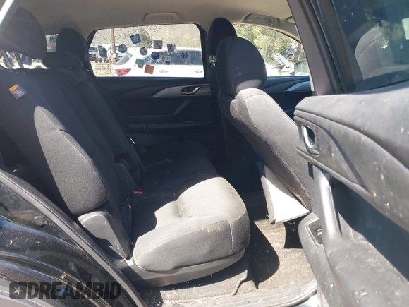 2020 Mazda CX-9 Sport with VIN JM3TCABY8L0407430, listed as a IAAI auction lot 42288490 with 50,317 mi miles and . Bid and sale history available at DreamBid. Image 8.