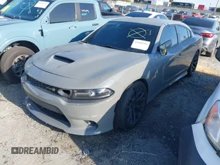 2019 Dodge Charger Scat Pack with VIN 2C3CDXGJ6KH542229, listed as a IAAI auction lot 41989204 with 28,388 mi miles and . Bid and sale history available at DreamBid. Image 18.