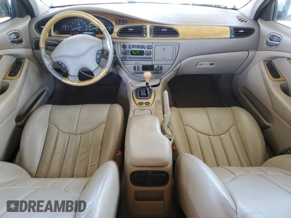 2000 Jaguar S-Type V8 z VIN SAJDA01D7YGL39410, wystawiony jako Copart lot #56814185 z przebiegiem 47 861 mil mil oraz Szkoda całkowita • Salvage title. Historia ofert i sprzedaży dostępna na DreamBid. Obrazek 8.