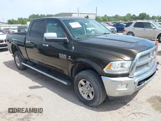 2013 Ram 2500 Laramie with VIN 3C6UR5FL7DG529590, listed as a IAAI auction lot 42266965 with 141,603 mi miles and . Bid and sale history available at DreamBid. Image 1.