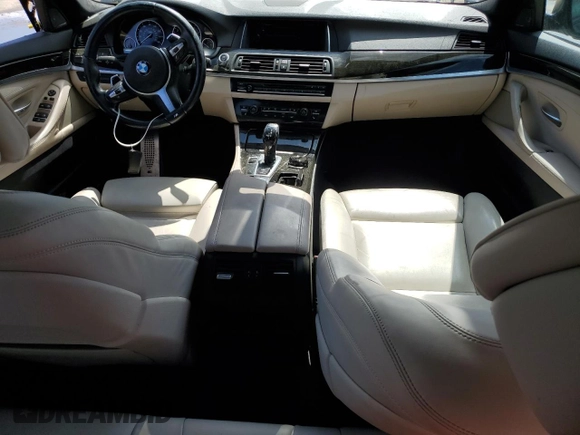 2014 BMW 5 Series 535i with VIN WBA5B1C57ED479494, listed as a Copart auction lot 51990735 with 86,978 mi miles and Salvage Title. Bid and sale history available at DreamBid. Image 8.