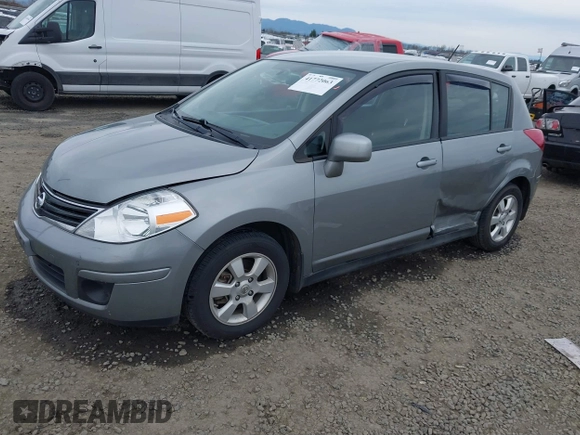 2012 Nissan Versa S with VIN 3N1BC1CP1CK807948, listed as a IAAI auction lot 41772063 with 87,126 mi miles. Bid and sale history available at carsss.com. Image 2.