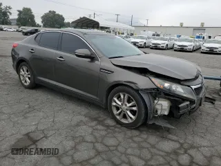 2013 Kia Optima EX with VIN 5XXGN4A78DG107255, listed as a Copart auction lot 61015475 with 168,006 mi miles and Salvage title. Bid and sale history available at DreamBid. Image 4.