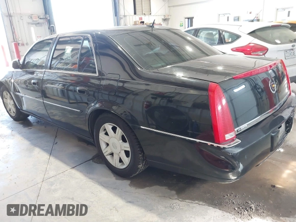 2006 Cadillac DTS 1SB z VIN 1G6KD57Y16U185783, wystawiony jako IAAI lot #41696044 z przebiegiem 198 193 mil mil oraz . Historia ofert i sprzedaży dostępna na DreamBid. Obrazek 3.