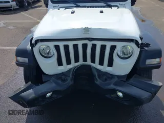 2023 Jeep Wrangler Willys with VIN 1C4HJXDG5PW566145, listed as a IAAI auction lot 41912872 with 50,290 mi miles and . Bid and sale history available at DreamBid. Image 6.