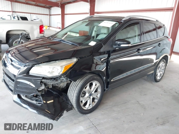2015 Ford Escape Titanium with VIN 1FMCU0J98FUB95597, listed as a IAAI auction lot 41785188 with 84,141 mi miles. Bid and sale history available at carsss.com. Image 2.
